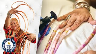 Cutting The Worlds Longest Fingernails  Guinness World Records [upl. by Ott]