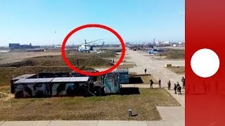 Video Ukrainian pilots escape with aircraft as troops take over air base [upl. by Laubin]