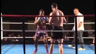 Papua New Guinean Kickboxer spin kicks a much taller opponent to sleep knock out [upl. by Nyleimaj60]