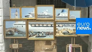 Watch Guerrilla artist Banksy sets up stall outside Venice Biennale [upl. by Salangia]