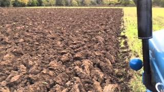 Fordson Power Major ploughing with a Ransomes TS82 [upl. by Nabru]