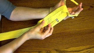 How to tie a childrens necktie [upl. by Itak8]