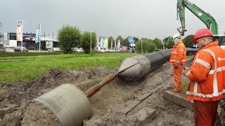 Pulling in a main sewer pipe  rioolbuis trekken [upl. by Ecidnacal]