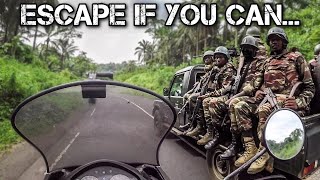 ESCAPE from a COUNTRY at WAR  Motorcycle World Tour  Africa 51 [upl. by Lowis442]