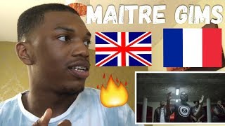 Maître Gims  Sapés comme jamais Clip Officiel ft Niska REACTION [upl. by Wellesley]