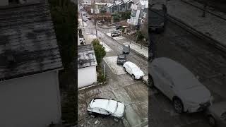 Car slides and crash down icy Seattle hill [upl. by Trey]