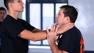 How to Defend against a Front Choke  Krav Maga Defense [upl. by Atteynot]